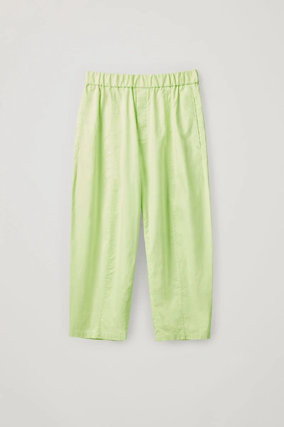 Shop Cos Elasticated Organic-cotton Pants In Green