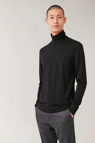 Shop Cos Merino Wool Turtleneck Jumper In Black