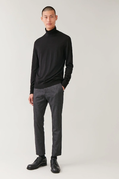 Shop Cos Merino Wool Turtleneck Jumper In Black