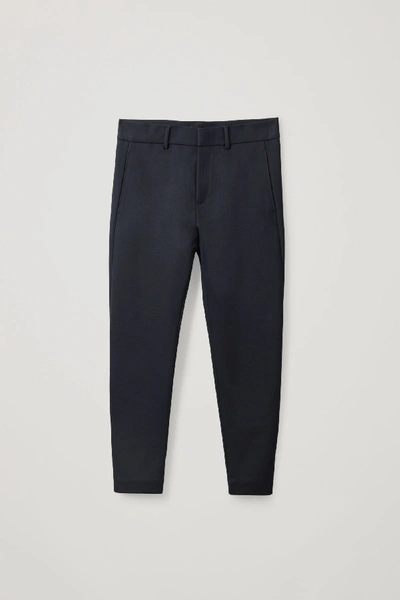 Shop Cos Slim-fit Zipped Hem Trousers In Blue