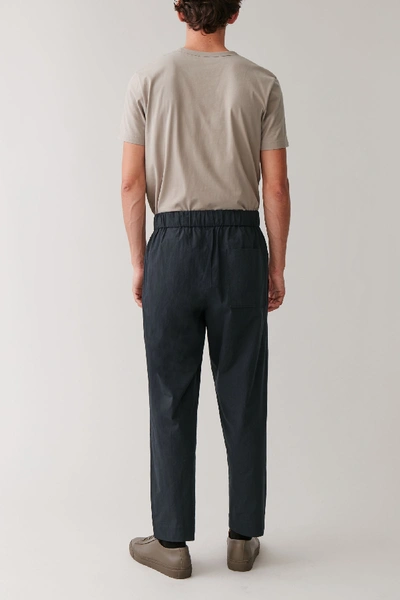 Shop Cos Relaxed-fit Drawstring Trousers In Blue