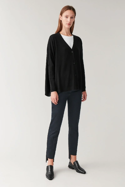 Shop Cos Knitted Wool Cardigan In Black