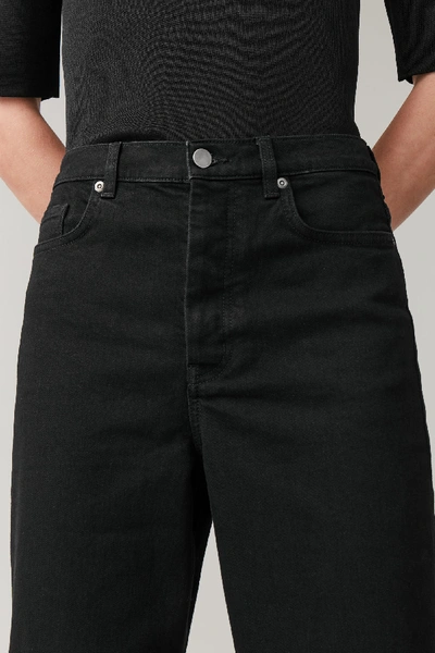 Shop Cos Tapered High-rise Jeans In Black