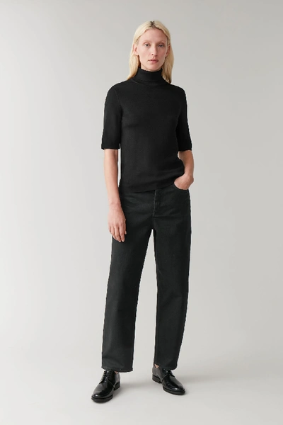 Shop Cos Tapered High-rise Jeans In Black