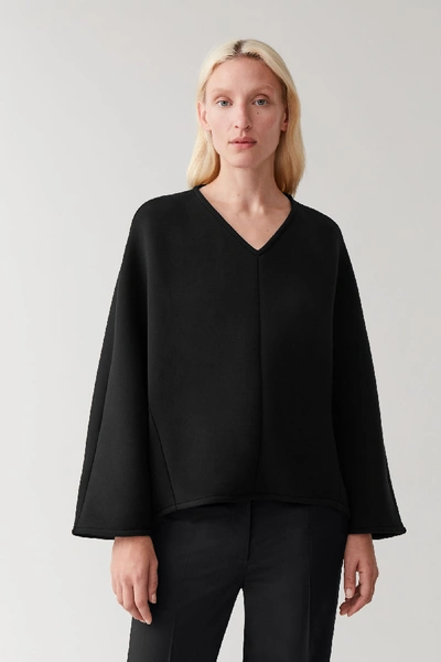 Shop Cos Batwing Scuba Sweater In Black