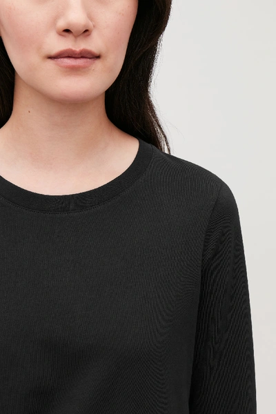 Shop Cos Straight-hem Long-sleeved Top In Black