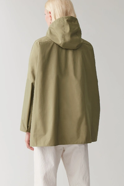 Shop Cos Light Packable Raincoat In Green