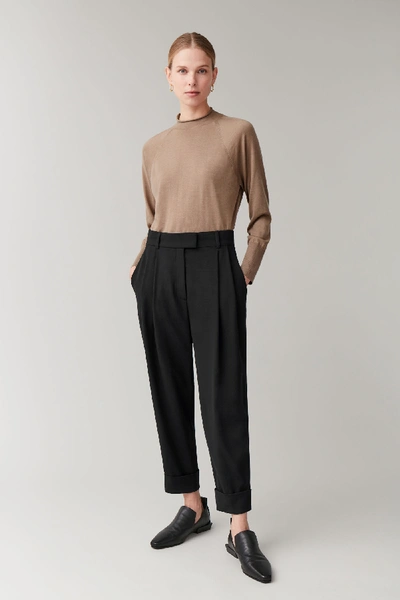 Shop Cos Dropped Crotch Trousers With Pleats In Black