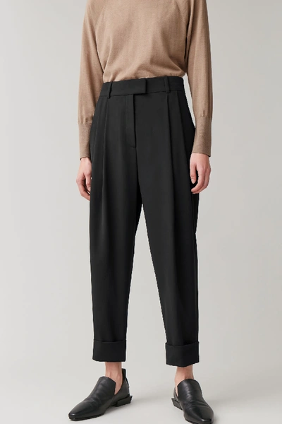 Shop Cos Dropped Crotch Trousers With Pleats In Black