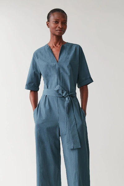 Shop Cos Belted Jumpsuit With V-neck In Blue