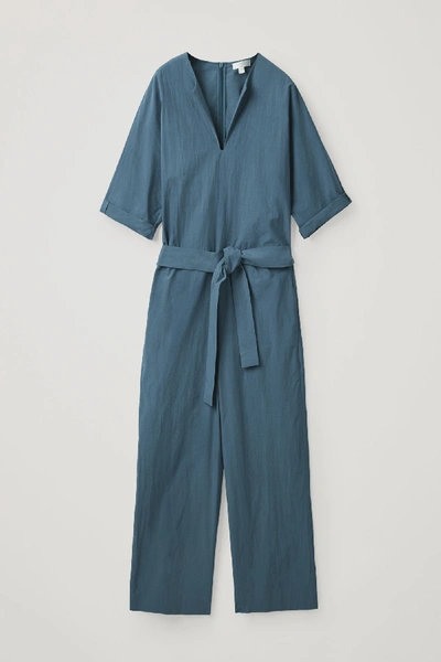 Shop Cos Belted Jumpsuit With V-neck In Blue