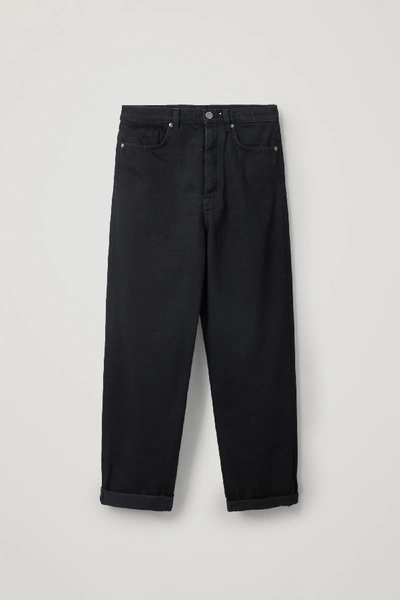 Shop Cos Tapered Leg Jeans In Black