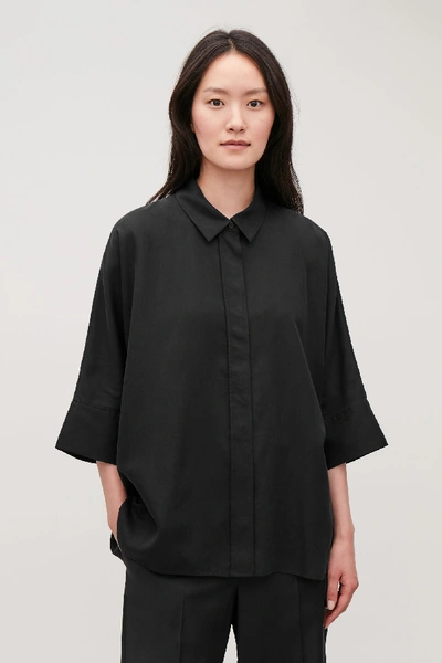 Shop Cos Draped Wide-fit Shirt In Black