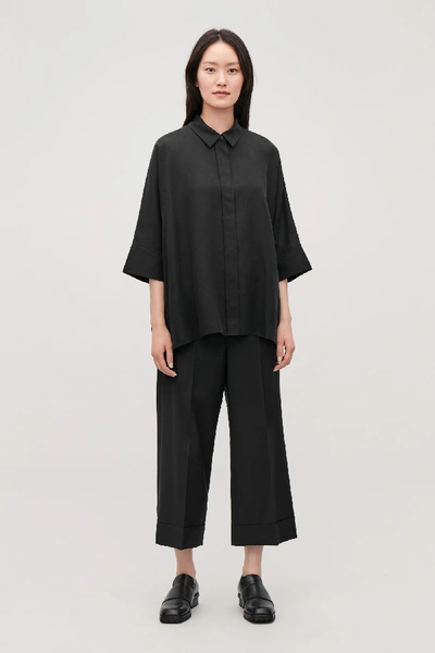 Shop Cos Draped Wide-fit Shirt In Black