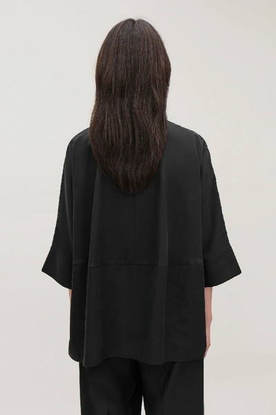 Shop Cos Draped Wide-fit Shirt In Black
