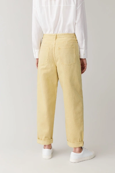 Shop Cos High-waisted Organic Cotton Tapered Jeans In Yellow