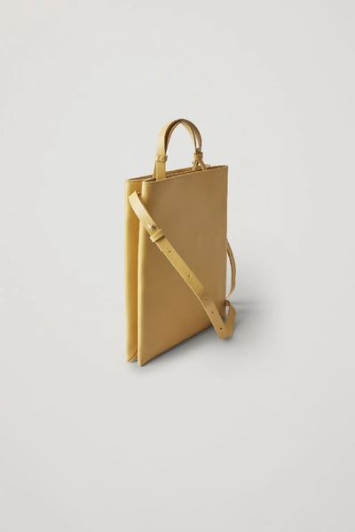 Shop Cos Mini Leather Tote In Yellow