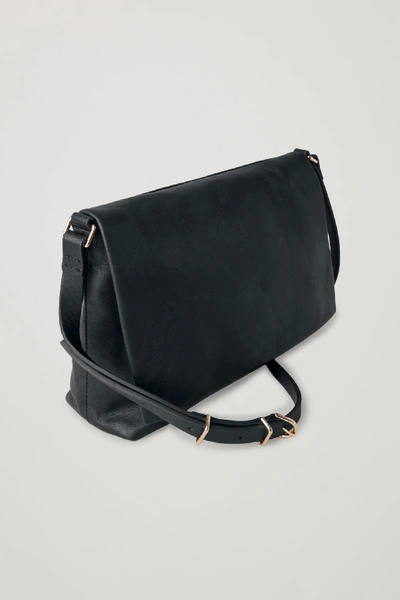 Shop Cos Small Soft-leather Shoulder Bag In Black