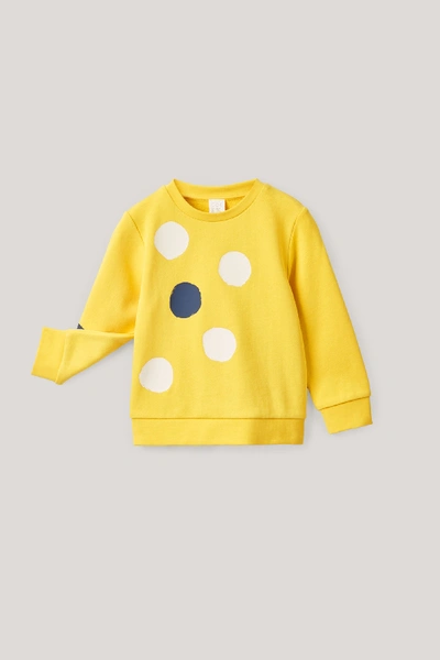 Shop Cos Dot-printed Cotton Sweatshirt In Yellow