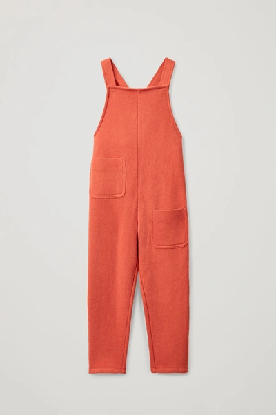 Shop Cos Cotton Jersey Dungarees In Orange