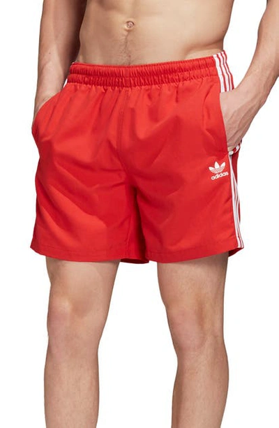 Shop Adidas Originals 3-stripes Swim Trunks In Lush Red