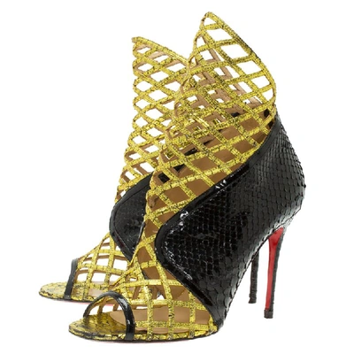 Pre-owned Christian Louboutin Black And Gold Python Bougliona Cage Ankle Boots Size 38.5