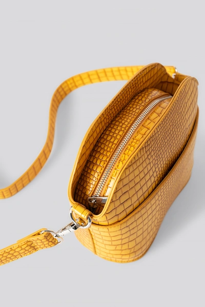 Shop Na-kd Rounded Croc Crossbody Bag Yellow