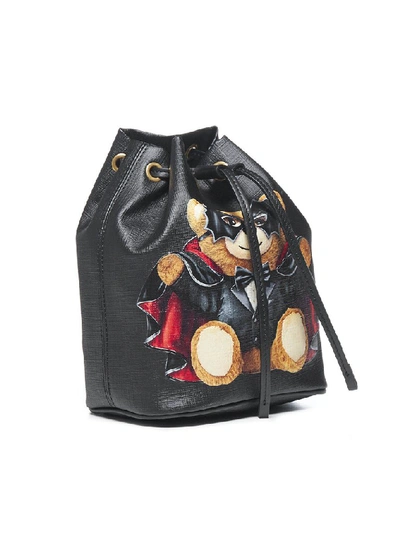 Shop Moschino Teddy Print Bucket Bag In Black