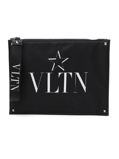 Shop Valentino Garavani Vltn Star Printed Clutch Bag In Black
