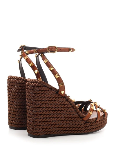 Shop Valentino Garavani Rockstud Wedges In Brown