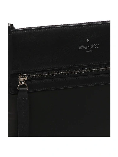 Shop Jimmy Choo Konor Logo Messenger Bag In Black