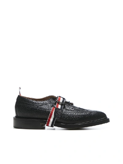 Shop Thom Browne Logo Strap Wingtip Brogues In Black