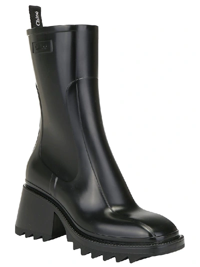 Shop Chloé Betty Logo Embossed Rain Boots In Black