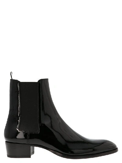 Shop Saint Laurent Wyatt Ankle Boots In Black