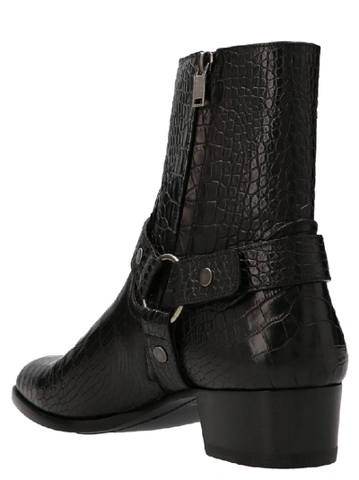 Shop Saint Laurent Wyatt Ankle Boots In Black