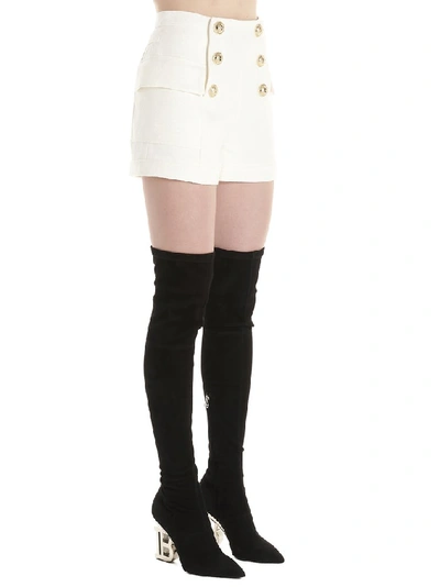 Shop Balmain High Waisted Buttoned Flap Shorts In White