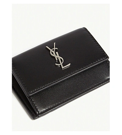 Shop Saint Laurent Logo Leather Flap Wallet In Black