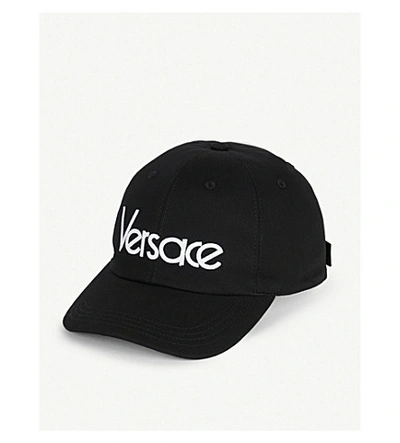 Shop Versace Logo-embroidered Cotton Baseball Cap In Black
