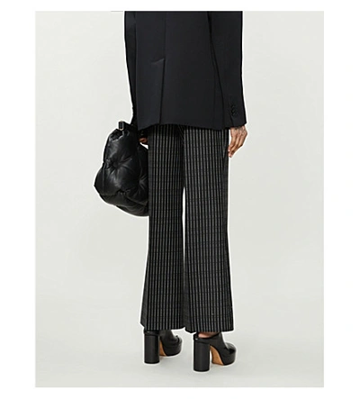 Shop Maison Margiela Pinstriped Flared-leg High-rise Wool Trousers In Black With Ivory Stripe