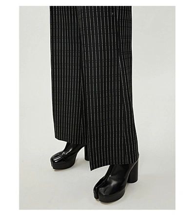 Shop Maison Margiela Pinstriped Flared-leg High-rise Wool Trousers In Black With Ivory Stripe