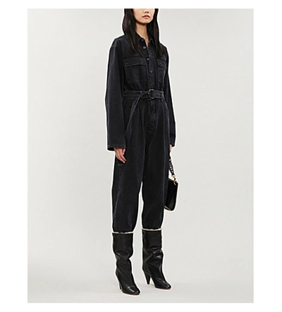 Shop Agolde Tatum Faded Waist-tie Denim Jumpsuit In Shade