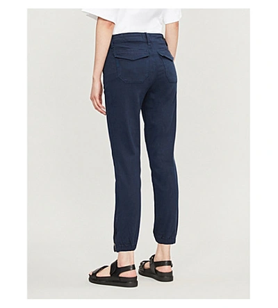 Shop Paige Women's Navy Blue Mayslie Mid-rise Tapered Woven Jogging Bottoms In Vintage Navy Storm