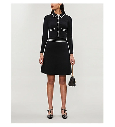 Shop Sandro Anna Knitted Mini-skirt In Black