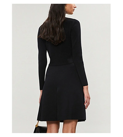 Shop Sandro Anna Knitted Mini-skirt In Black