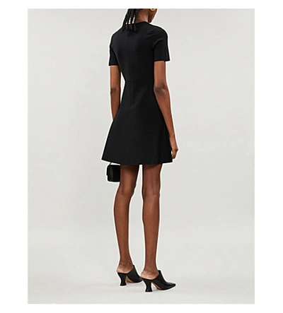 Shop Theory Flared Stretch-knit Mini Dress In Black