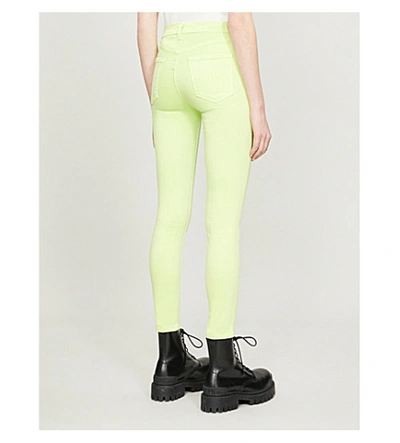 Shop J Brand Alana Skinny Mid-rise Jeans In Forsythia