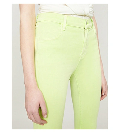 Shop J Brand Alana Skinny Mid-rise Jeans In Forsythia