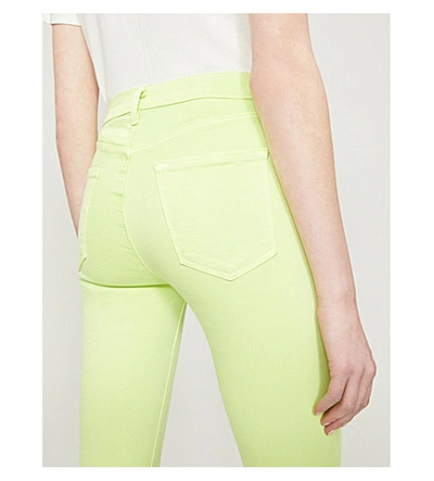 Shop J Brand Alana Skinny Mid-rise Jeans In Forsythia