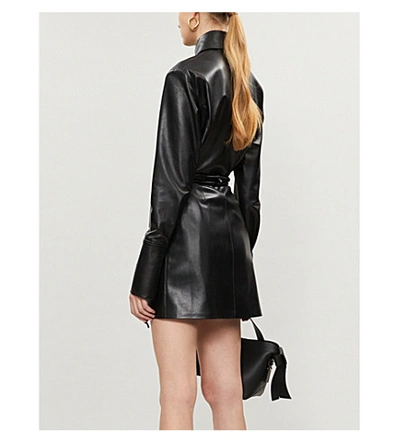 Shop Nanushka Seyoka Wrap-front Vegan Leather Mini Skirt In Black