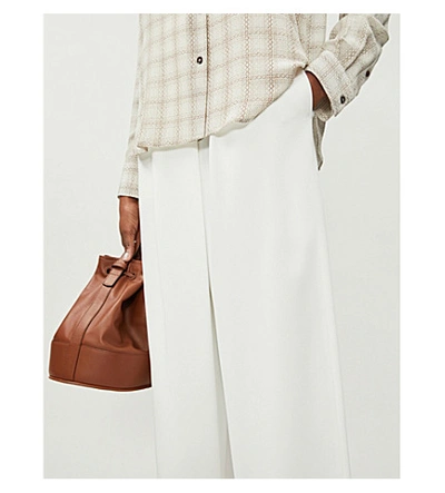 Shop Brunello Cucinelli High-rise Wide Crepe Trousers In White